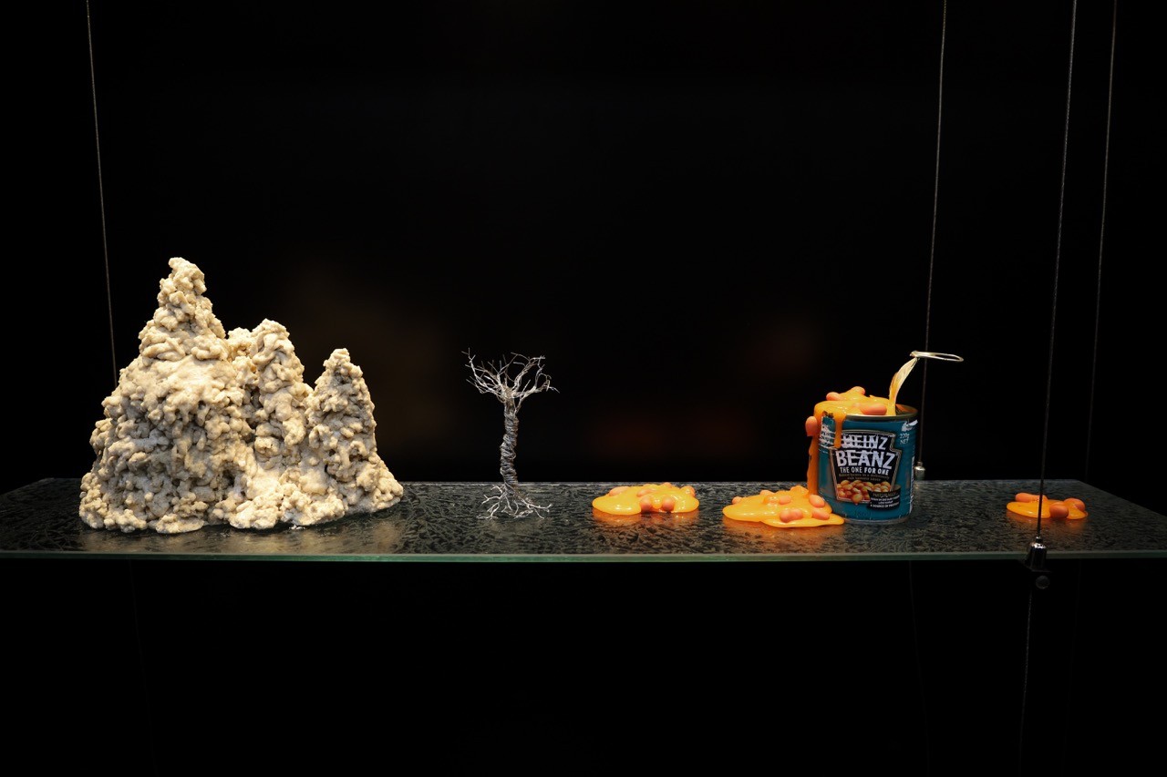 Close up of sculptures in glass display case