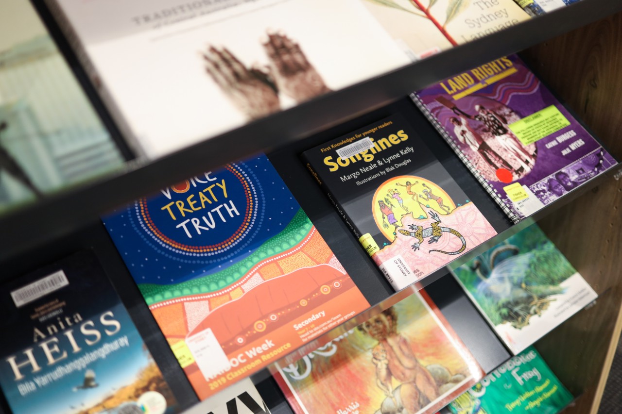 An array of First Nations books displayed on a shelf