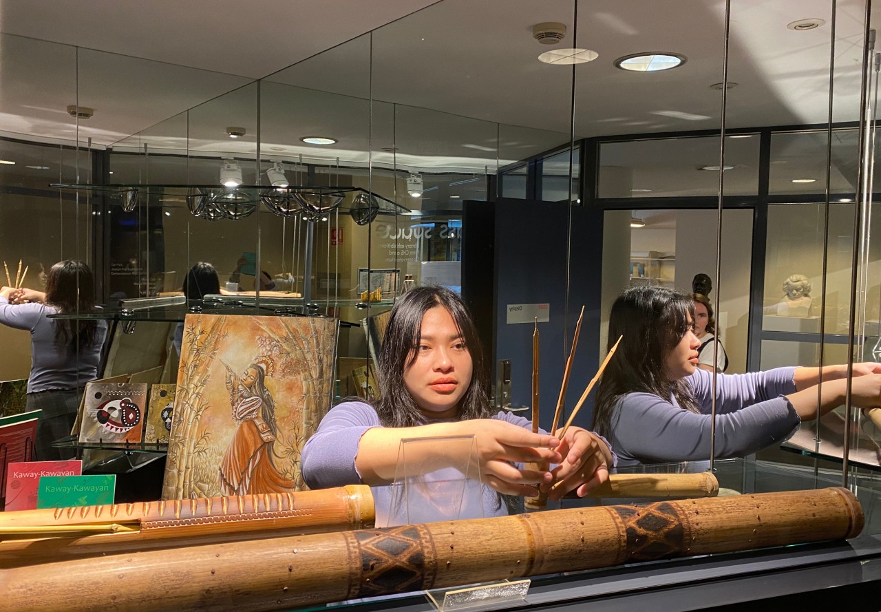 Starr Abelardo installing her exhibition Resilient Resonance