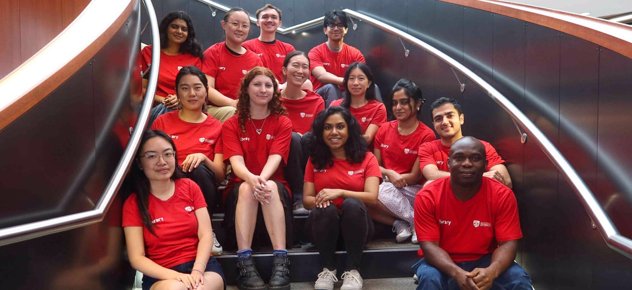 Overhead shot of paper booklets and stamp pad 