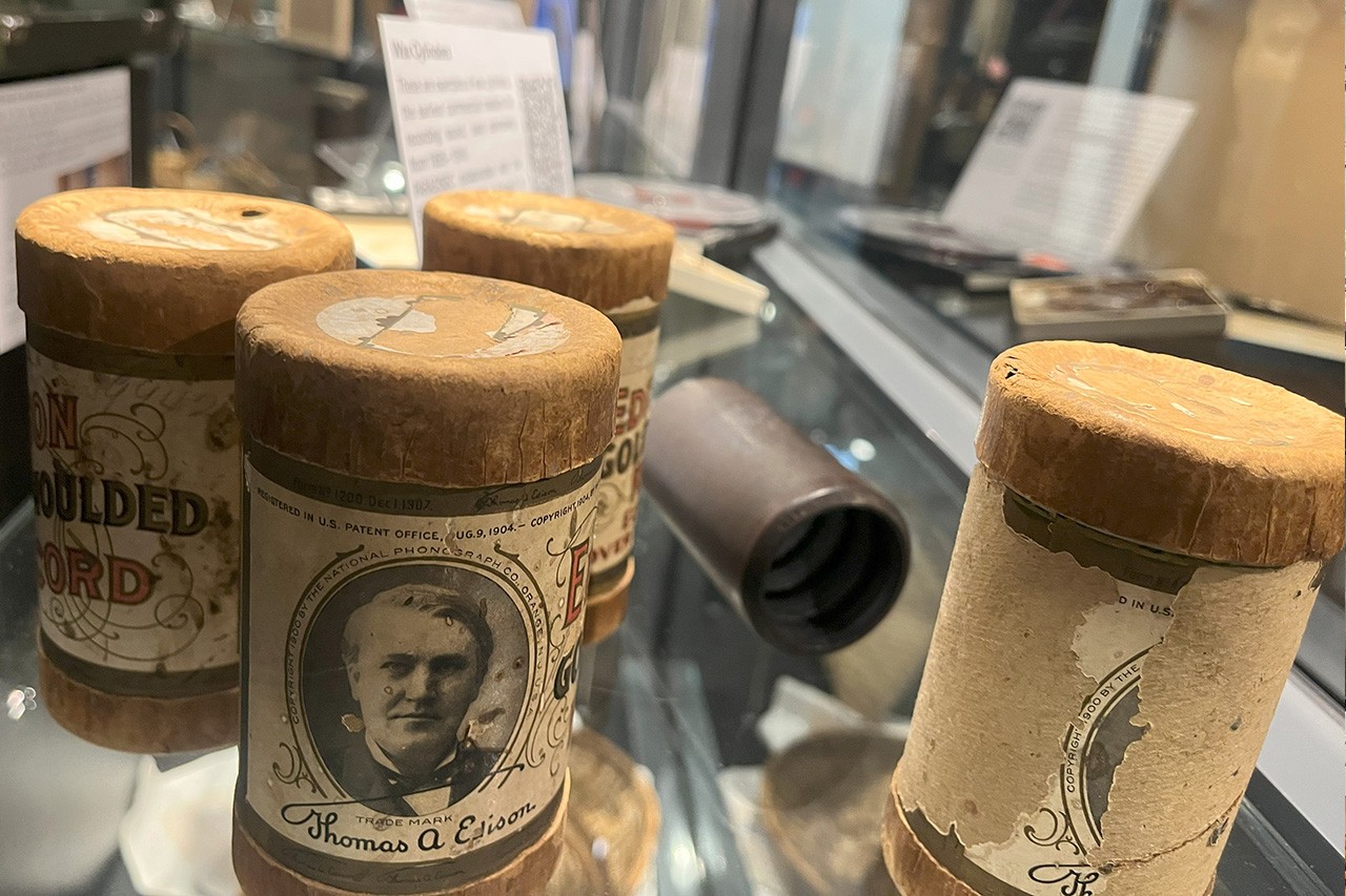 Cylinders on a glass shelf