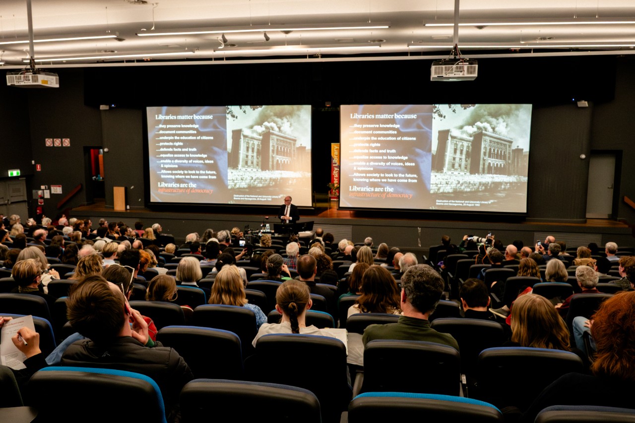Richard Ovenden speaking on lecture theatre