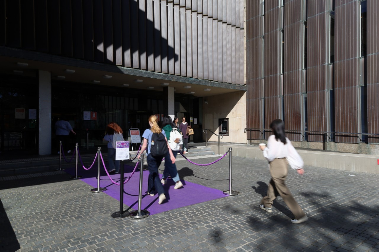 Purple carpet in front of Fisher Library