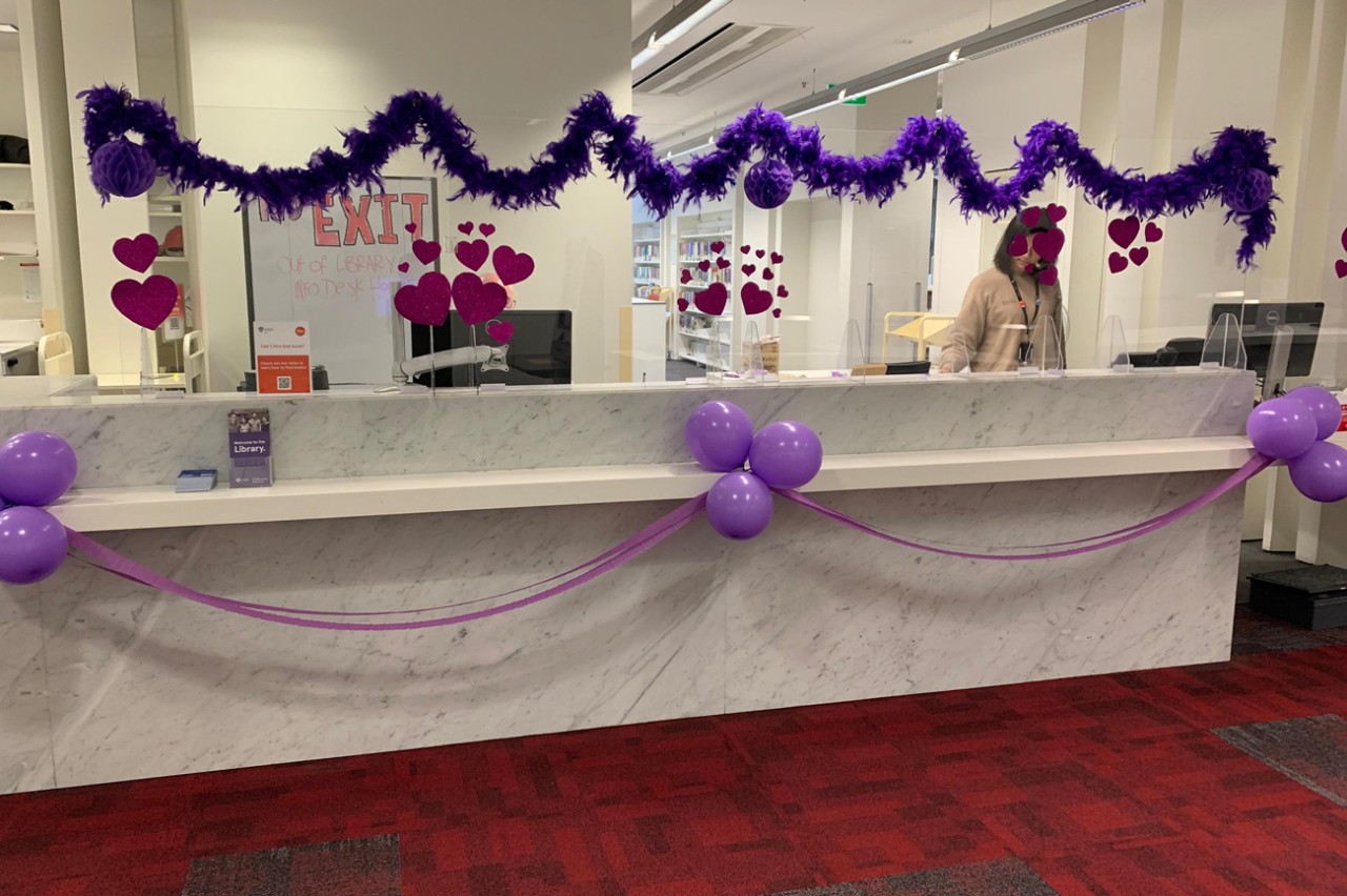 Purple carpet in front of Fisher Library