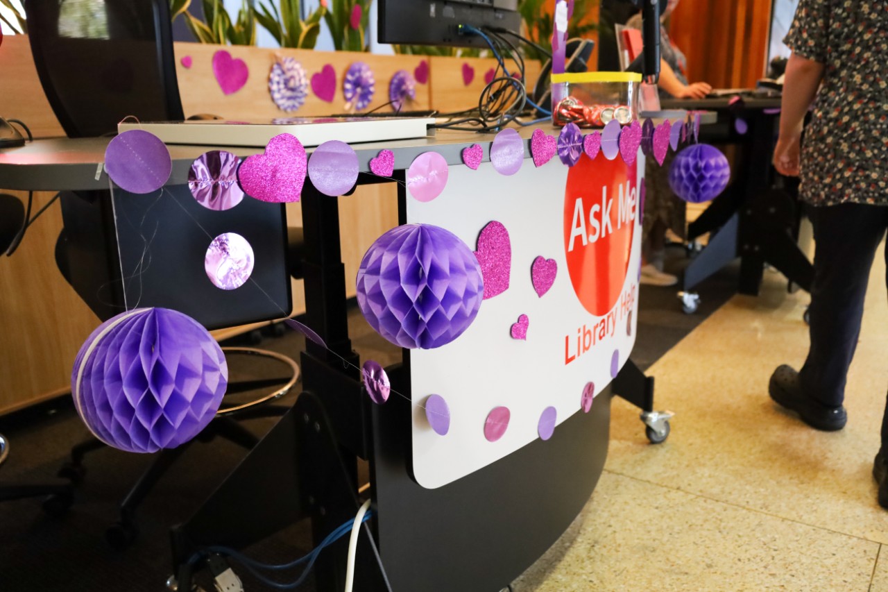 Purple decorations at Library service point