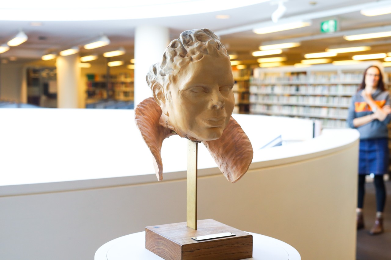 Statue of Deborah Cheetham on a plinth in the Conservatorium Library